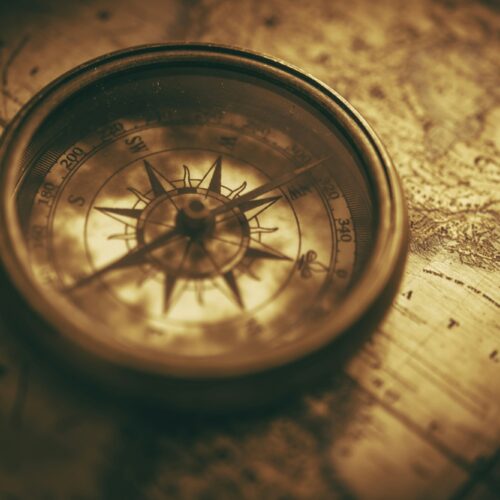 Vintage Compass Device on a Aged Map
